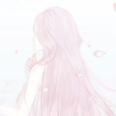 a woman with long pink hair standing in front of a white wall and holding her hand to her face