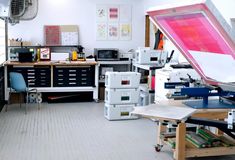 a room filled with lots of clutter and furniture