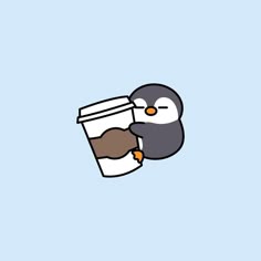 a penguin is holding a cup of coffee