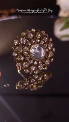 Stunning Antique Gold Look Polki Rings for Wedding Functions.  Making: Ring is Uniquely handcrafted by our Skilled Master Goldsmith Craftsman with detailed finishing.  Stone: These stunning ring have Excellent Lusture of Moissanite Polkis like real.   Polki: Moissanite (Lab made)  Metal: 92.5 Silver (Hallmarked)  #silvermoissanitejewelry #semipreciousjewellery #polkijewellery #jadaujewellery #moissanitepolki #indianjewelleryonline #moissanitepolkijewellery #indianweddingjewellery #traveljewellery #destinationweddingjewellery #paldzigns #trendingreels #instagramreels #onlinejewellerystore #onlinejewellery #diamondpolkijewellery #indiantraditionaljewellery #reallookingjewelry #polkijewelry #weddingjewelry #ring #polkiring #rings #silverring #rubyjewelry Pearl Ring Design, Amrapali Jewels, Small Earrings Gold, Kundan Jewellery Bridal, Indian Wedding Jewelry Sets, Diamond Wedding Jewelry, Antique Jewellery Designs, Jewelry King, Gold Mangalsutra Designs