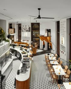 the interior of a restaurant with tables, chairs and an open air grill in the center
