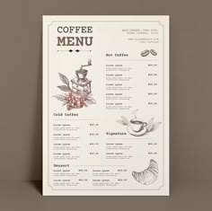 a menu for coffee is shown on a table