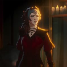 a woman in a red dress standing next to a shelf with candles on top of it