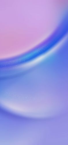 an abstract blue and pink background with some blurry lines on the bottom right corner