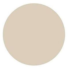 an image of a white circle with some light brown colors on the top and bottom