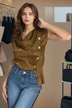 Leading Wholesaler of Ladies' High Fashion Garments. Distributor of Women's Designer Clothing in Missy and Plus sizes to Fine Boutiques all over the world. Located in NYC our stylish Tops, Dresses, Skirts and Trendy Blouses range from Glamorous and Sophisticated to everyday Casual. Gold Tops With Button Closure For Party, Casual Gold Tops With Buttons, Chic Gold Tops With Button Closure, Luxury Semi-stitched Bollywood Tops, Luxury Gold Blouse For Formal Occasions, Fitted Gold Top For Festive Occasions, Fitted Gold Top With Button Closure, Gold Blouse With Button Closure For Formal Occasions, Gold Party Top With Button Closure