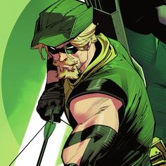 the green arrow is standing with his bow in hand and looking at something off to the side