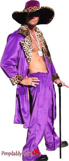 a man in a purple outfit with a leopard print hat and cane is posing for the camera