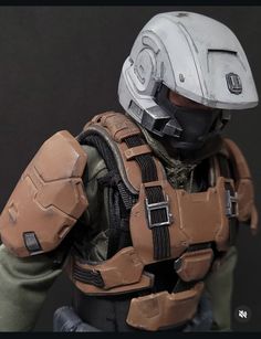 a close up of a person wearing a helmet and armor
