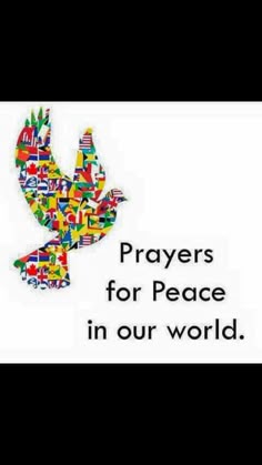 a white sign with the words, prayers for peace in our world