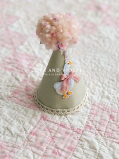a small vase with some flowers in it