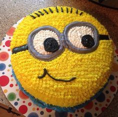 a birthday cake decorated to look like a smiling face