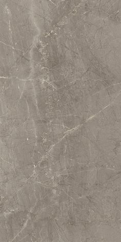 a gray marble textured wallpaper with white and black lines on the bottom right corner