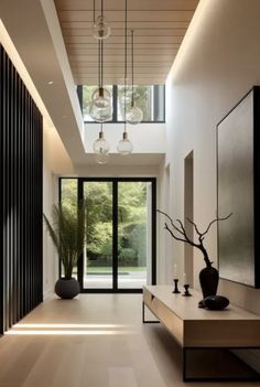 the hallway is clean and ready for us to use as an entrance way in this modern home