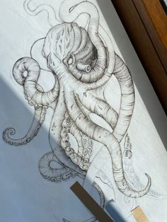 a drawing of an octopus on a piece of paper