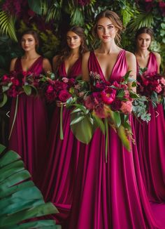 the bridesmaids are dressed in bright pink gowns and holding their bouquets