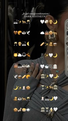 the woman is holding up her cell phone to show it's buttons and icons