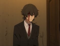 a man in a suit and tie standing next to a door with blood on his face
