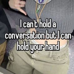 a woman with her back to the camera and texting i can't hold a conversation but i can hold your hand