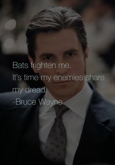 a man in a suit and tie with a quote from bruce wayne