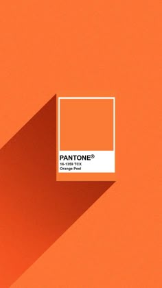 an orange pantone color is shown on the wall