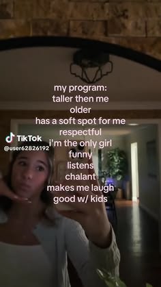 a woman taking a selfie in front of a mirror with the caption'my program taller then me has a soft spot for me '
