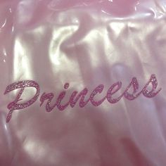 a pink bag with the word princess written on it and glittered letters across the front