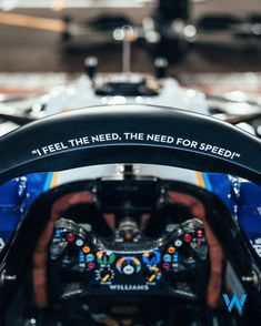 the inside of a race car with its steering wheel and dashboard showing, i feel the need for speed