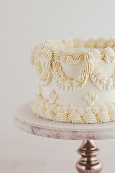 a white cake sitting on top of a table