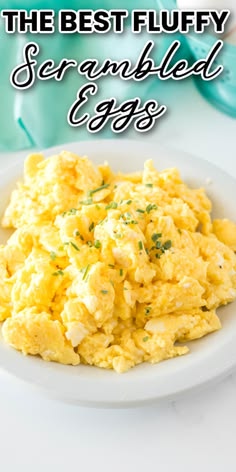 scrambled eggs on a white plate with the words, the best fluffy scrambleble eggs