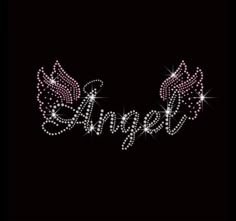 the word angel with wings and sparkles on a black background