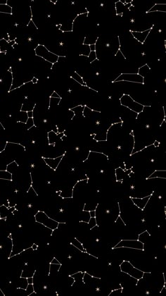 the night sky with stars and zodiac signs in gold on black background, seamless