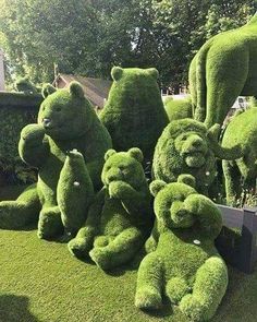 there are many fake teddy bears in the grass