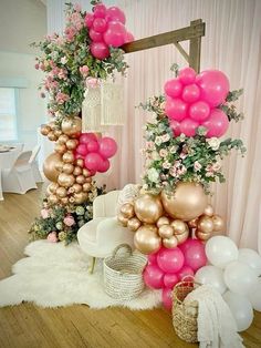 some balloons and flowers are on the floor