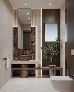 a bathroom with marble walls and flooring next to a plant in a vase on the counter