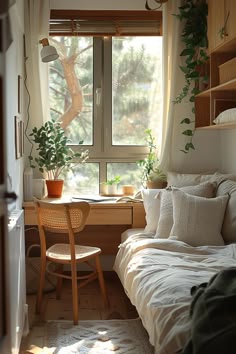a bed sitting under a window next to a desk