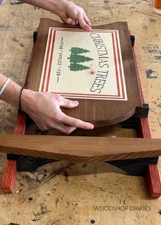 a person that is making something out of wood