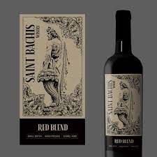 a bottle of red wine sitting next to a card with the words, straddles