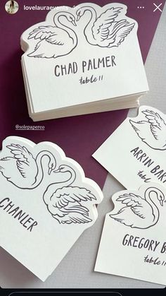 some stickers that are sitting on top of a purple table with the words chad palmer written