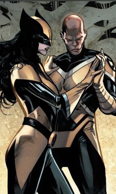 a man and woman dressed as batman and catwoman standing next to each other with their arms around each other