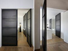 an open door leading to another room with wooden flooring and white walls in the background