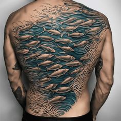 a man's back with many fish on it