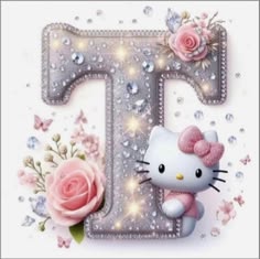 the letter t is decorated with pink roses and glitters, as well as a hello kitty figurine