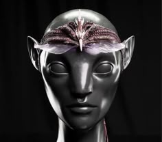 a mannequin's head with an unusual hair piece on top of it