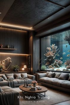a living room filled with furniture and an aquarium