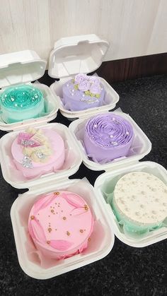 there are many different types of cakes in the trays