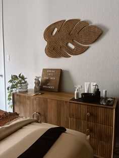 Esti esthetician - esthetician supplies -  spa room set up spa room decor - spa decor - esti room - skincare - skin care - esti table - massage table - solo esthetician - small bizz owner Earthy Esthetician Rooms, Boho Theme Esthetician Room, Esthetician Table Set Up, Earth Tone Esthetician Room, Boho Esthetician, Trendy Esthetican Spa, Natural Esthetician Room, Spa Decor Ideas Estheticians Esthetics Room Body Waxing, Neutral Esthetician Room