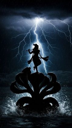 the silhouette of a woman standing on top of a flower in front of a lightning