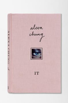 a pink book with an eye and the words, alex chuang it written in cursive writing