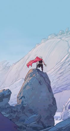 a man standing on top of a snow covered mountain next to a giant rock with a red flag